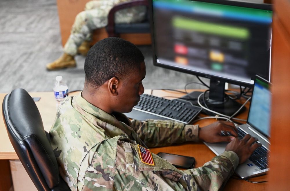 Service member at the computer